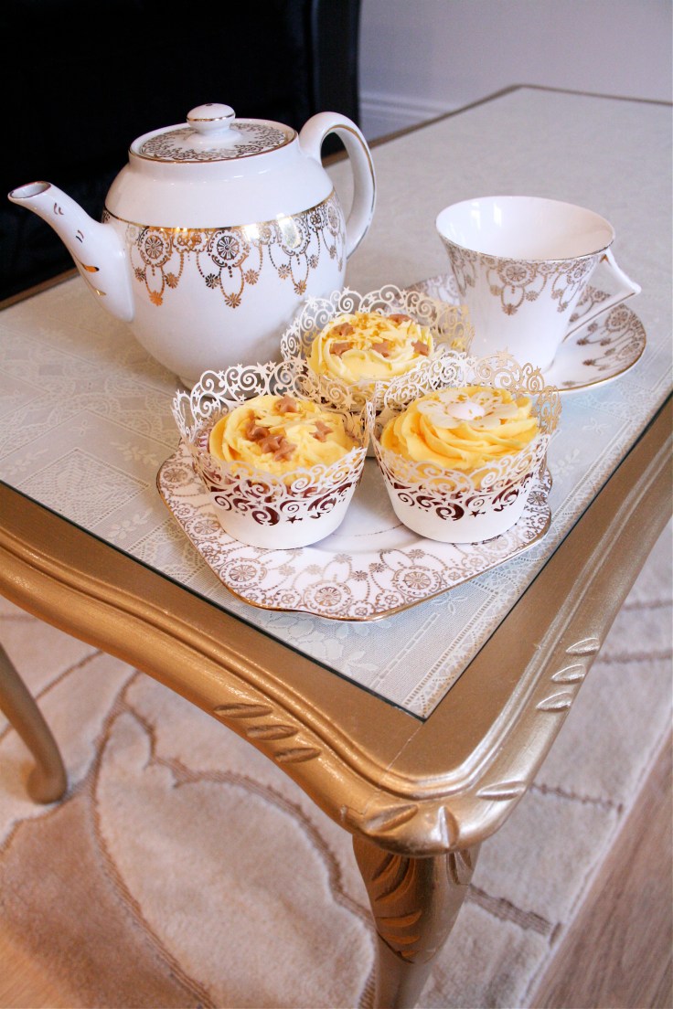 Upcycled / Recycled gold table with crockery and cupcakes