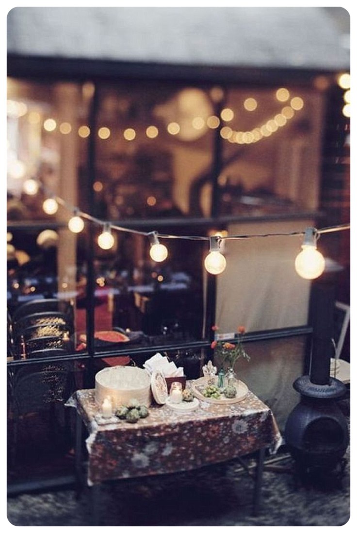 Courtyard festoon lighting via Hannah Ware