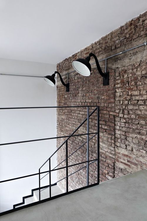Bare brick with contemporary industrial hallway